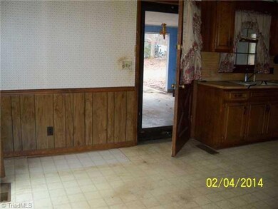 Breakfast. Breakfast/Dining Area off Kitchen.  Side exterior door leading to open-ended garage.