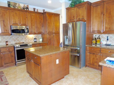GOURMET KITCHEN W/ CHEF S ISLAND