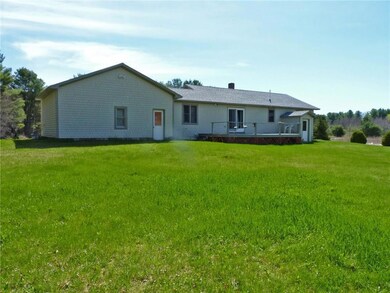 Another view of back home and lush lawn.