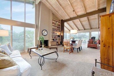 Living room with fire place looking toward dining 