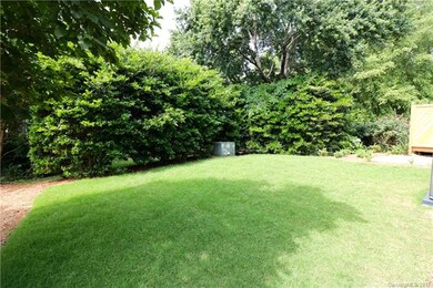 Rare find - flat, spacious, lush and private back 
