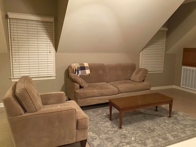 Couch, Sitting chair, coffee table, desk, TV with basic cable