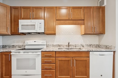 This kitchen just gleams with gorgeous finishes!
