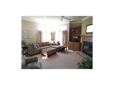 Cozy family room with Wood Burning fire place.  Op