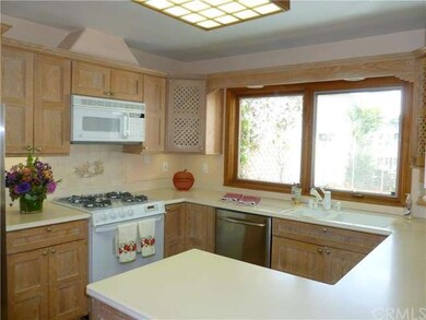 Updated kitchen - Corian counters, newer cabinets 