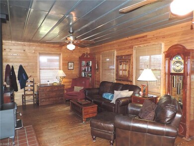 Tine ceiling, pine walls and oak flooring.