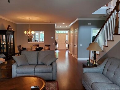 Open floor plan with a warm entry