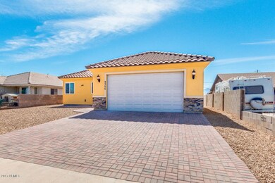 Paver Driveway & Gravel Landscape