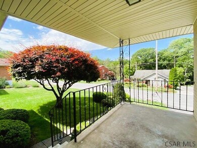 INVITING COVERED FRONT PORCH...
