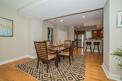 Dining area opens to kitchen and living room, givi