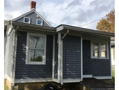 Rear of home. Shows tool storage and master bedroo