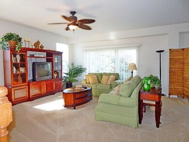 GRAND LOWER LEVEL* FAMILY ROOM WITH TRIPLE SLIDING