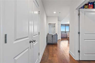 Corridor with dark wood-type flooring