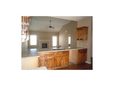 Kitchen looking into living room.