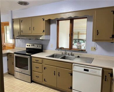 Kitchen showing the window to the sunroom