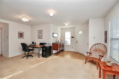 Large open dining room currently be used as an off