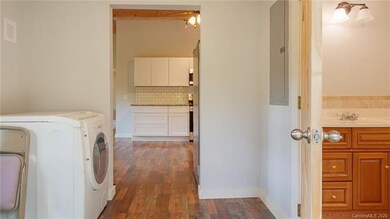 Laundry, Guest Bathroom & Kitchen
