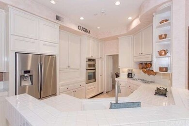 Bright kitchen with incredible storage.  Open to f