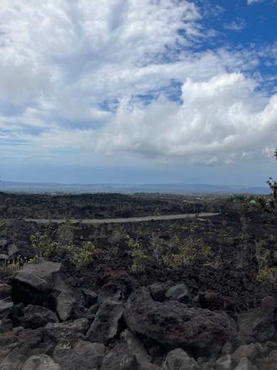 Looking southwest from lot.  Coastline and ocean view on a hazy day.