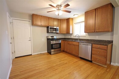 Eat in kitchen with stainless appliances