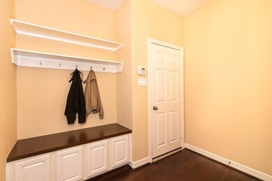 MUD ROOM LOCATED OFF THE GARAGE ENTRANCE