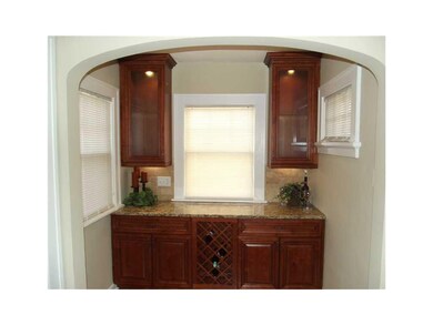 Kitchen. In cabinet lighting and wine storage in y