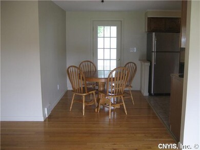 Dining Room. The dining L opens to the updated kit