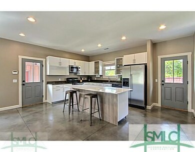 Kitchen. Modern kitchen features large island that
