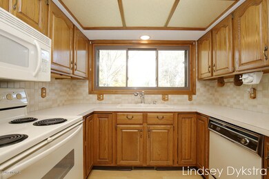 6981 Holly Hill Ct SW unit 65, Byron Center, MI 49315 - photo 7