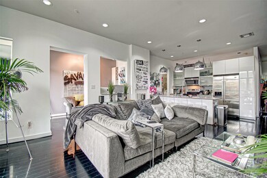 High ceiling and modern lighting in the kitchen.