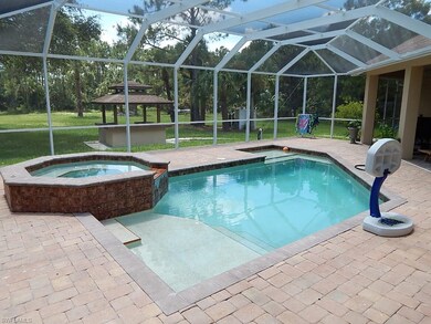 Refreshing Swimming Pool with Spillover Spa and 2 