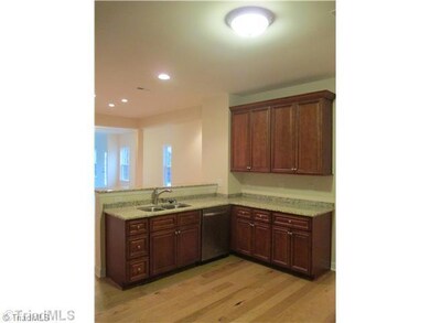 Kitchen. SIMILAR PHOTO - spacious kitchen! Whirlpool Gold stainless steel appliances and granite countertops are ALWAYS STANDARD!