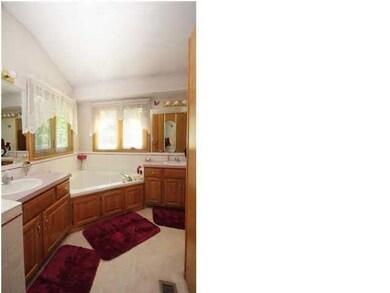 Master bath has seperate vanities, seperate bath a