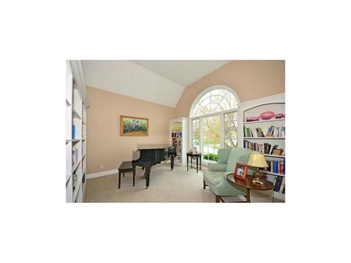 MAIN LEVEL OFFICE/LIBRARY JUST OFF ENTRY.