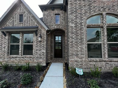 Beautiful brick elevation to welcome your guests.