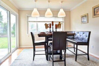 Light filled formal dining room, with a double pan