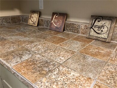 Neutral-colored tiles add beauty, texture and dura