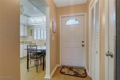 Foyer entrance featuring light wood-style floors