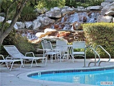 Pool area and waterfall...looks like a resort!