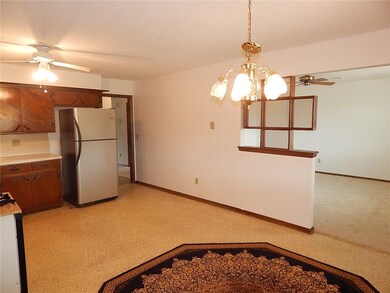 Another view of this lovely kitchen with an open f