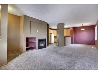Wide open main floor with gas fireplace and breakf
