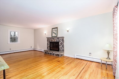 Front to back living room with fireplace
