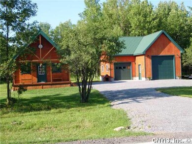 Exterior Front View of the home and the garage fro