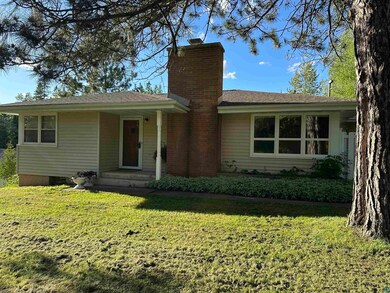View of front displaying the brick fireplace.