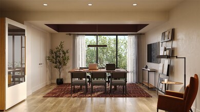 Dining area featuring light wood finished floors and recessed lighting
