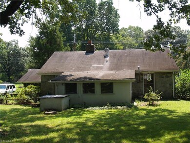 Shaded by mature trees, this rural setting offers nature lovers a sanctuary in the city.  Plenty of space for gardening and entertaining outdoors.