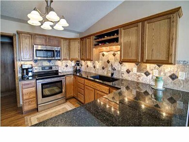 New Granite Counter Tops and Tile Backsplash with 