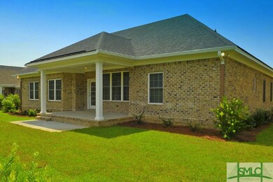 You will love the covered patio and low maintenanc
