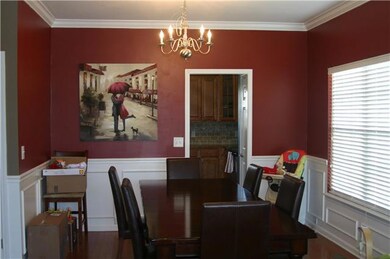 This is another view of the formal dining room just off kitchen and connected to the front formal living/sitting area.