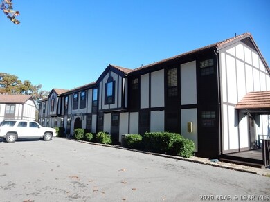 This second tier building has lots of parking just